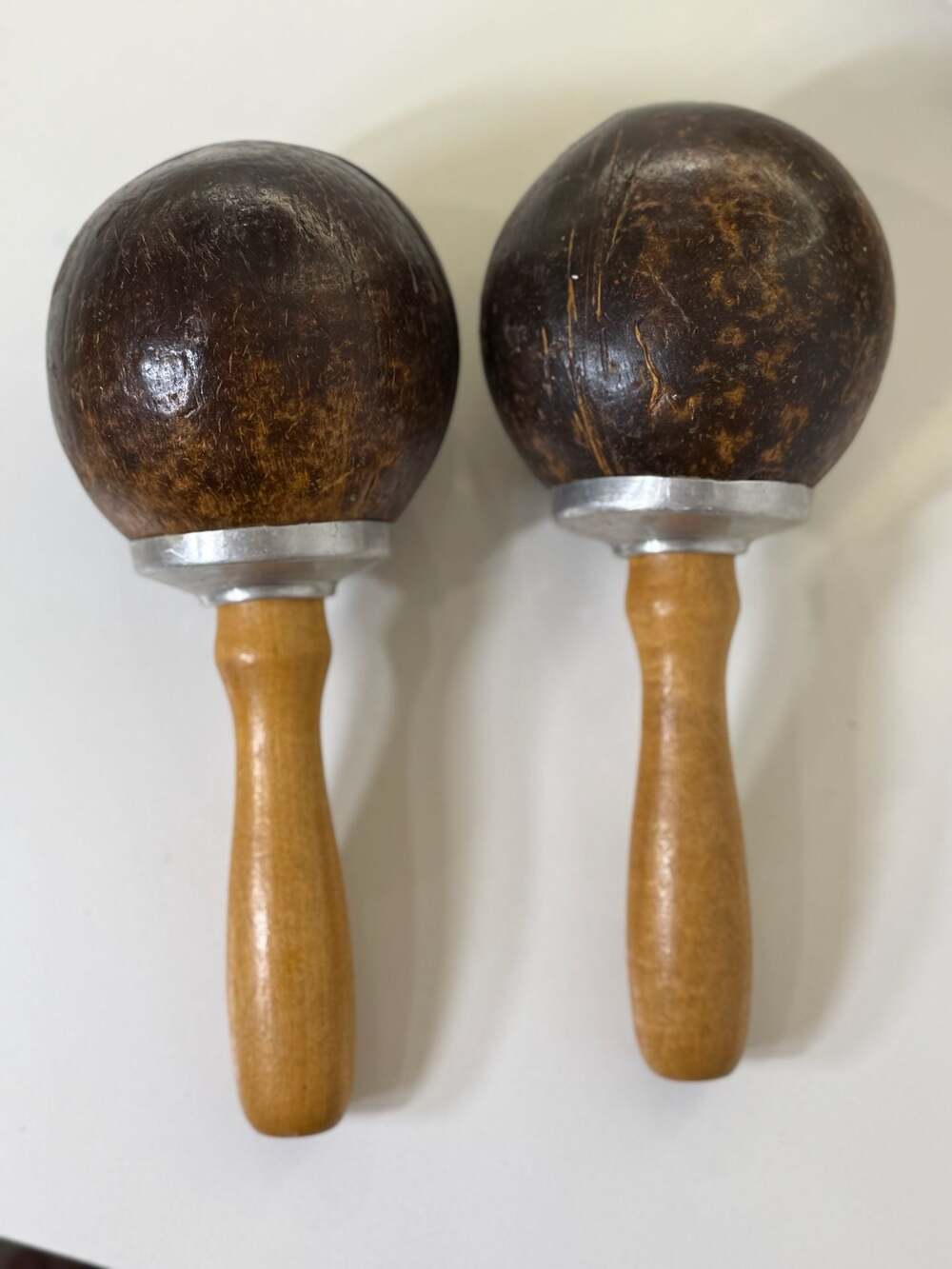 Handcrafted Coconut Shell Maracas with Wooden Handles